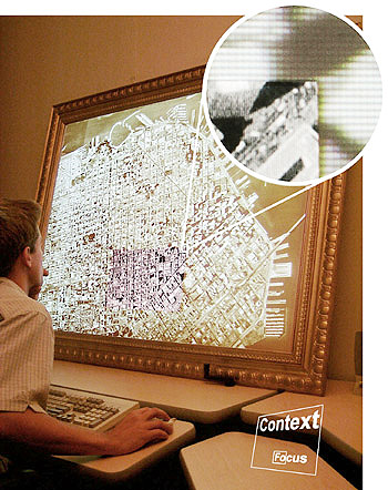 Patrick Baudisch inspiziert ein Satellitenbild auf einem Focus-plus-context Bildschirm